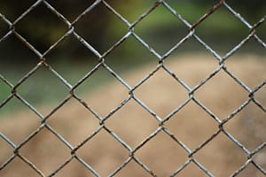 a close up of a chain link fence